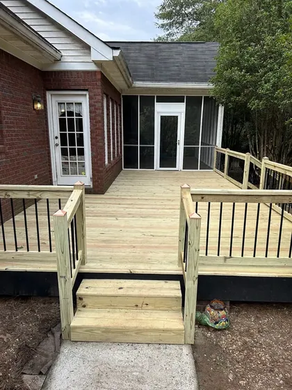 New wood deck with steps and railing on a brick home in Griffin GA
