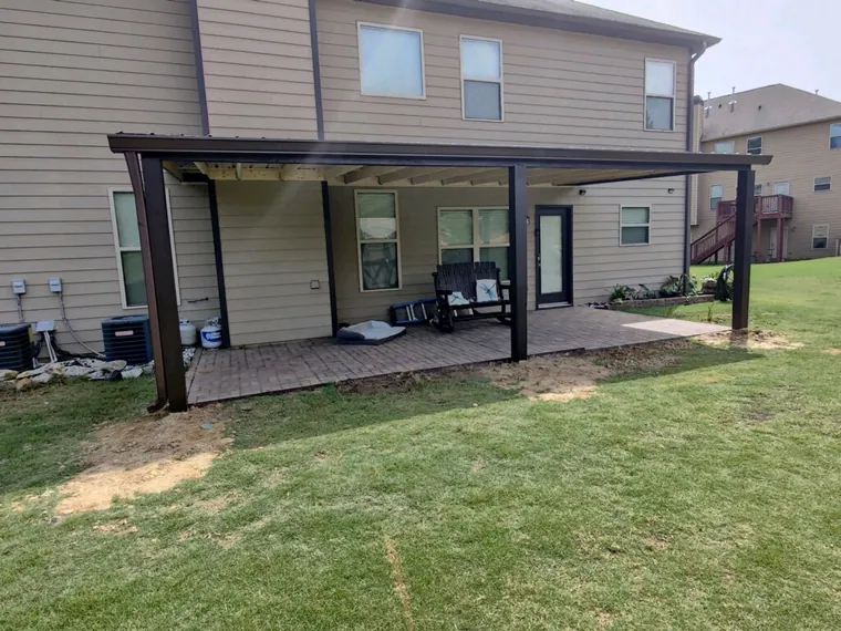 Covered patio with a pergola and outdoor seating