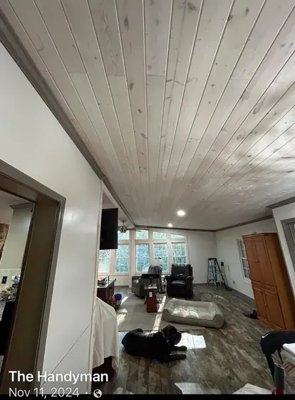 Interior remodel with a whitewashed plank ceiling